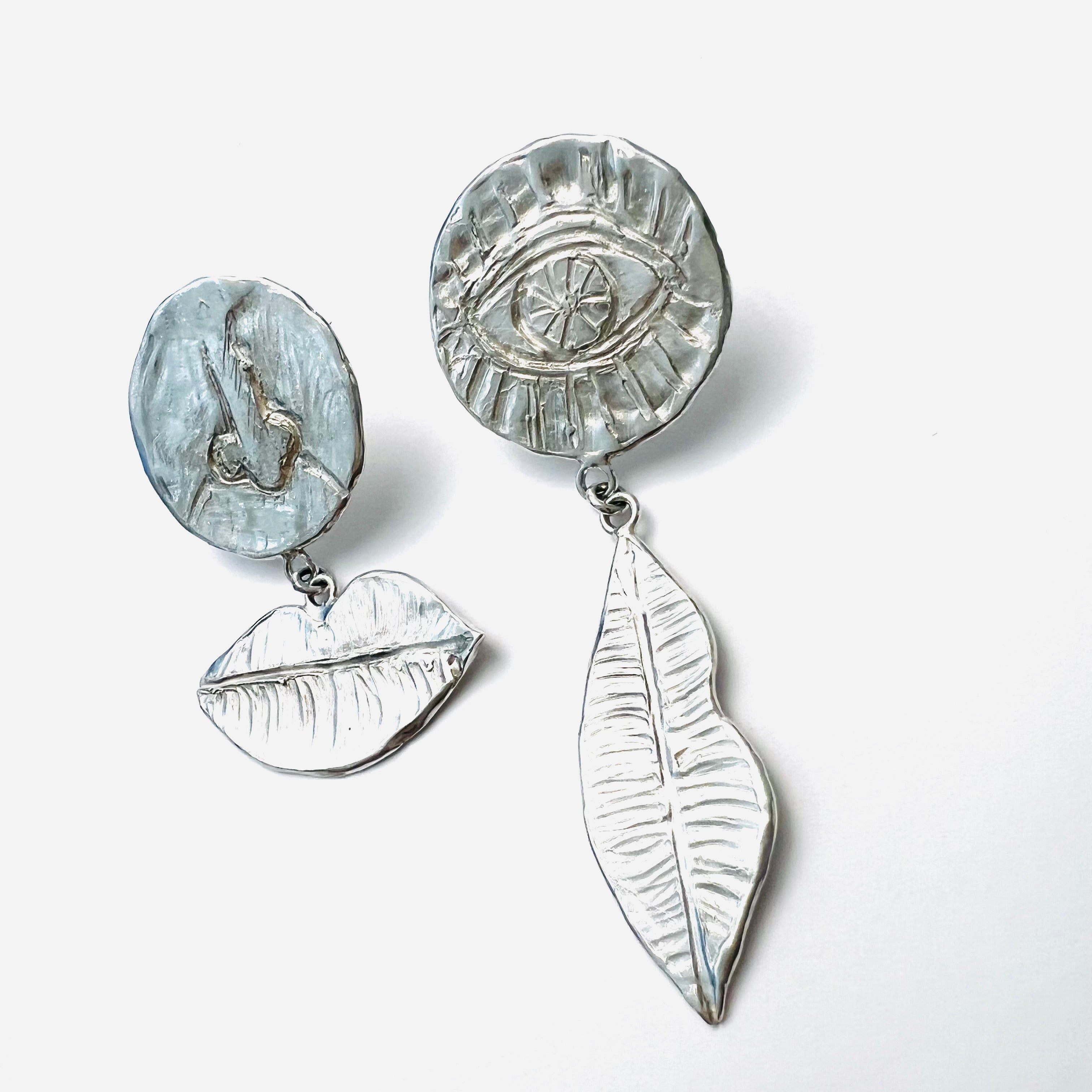 Diedreisinneohrhänger