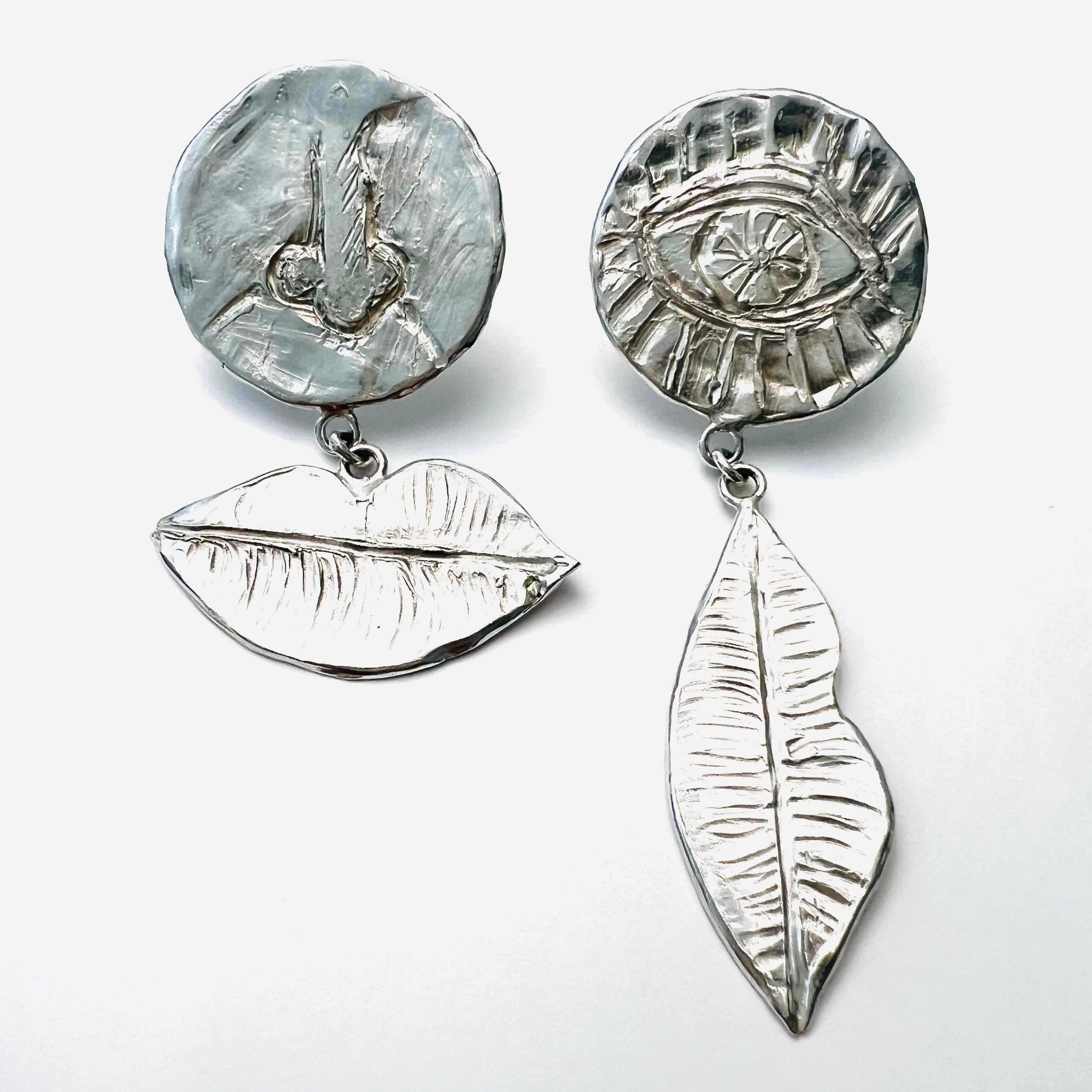 Diedreisinneohrhänger